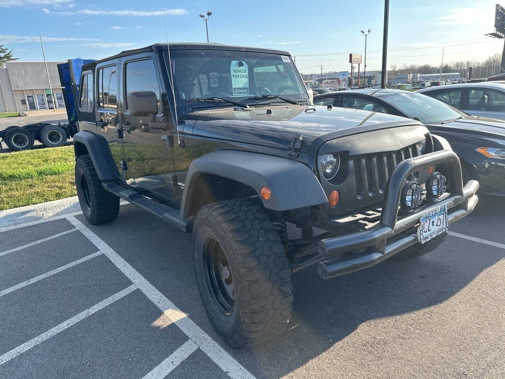 Used 2008 Jeep Wrangler Unlimited Sahara with VIN 1J8GA59108L576243 for sale in Rochester, Minnesota